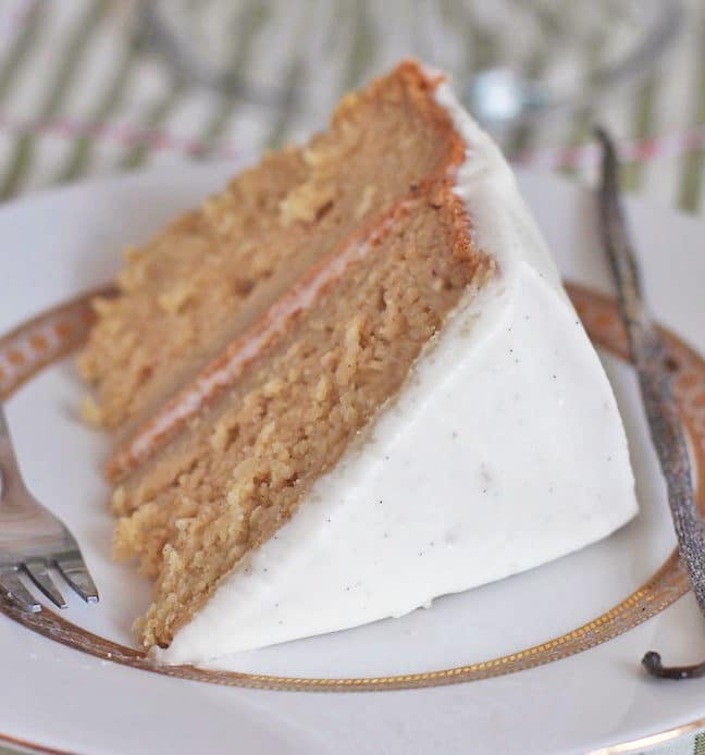 This Healthy Gluten-Free Vanilla Bean Cake is super moist and topped with a sweet and Vanilla Bean Frosting, it doesn't taste low fat and sugar free at all!
