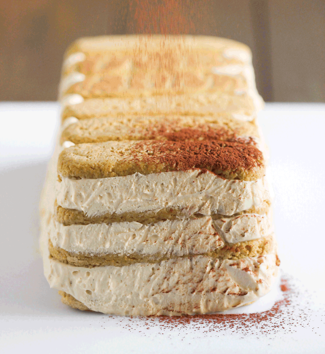 This Healthy Tiramisù is made completely from scratch, from the pastry cream to the ladyfingers! The creamy filling is rich and flavorful, the ladyfingers added texture and quality, and the cocoa provides balance and warmth to finish it all off. You’d never know this Tiramisù is sugar free and gluten free! Healthy Dessert Recipes at the Desserts With Benefits Blog (www.DessertsWithBenefits.com)