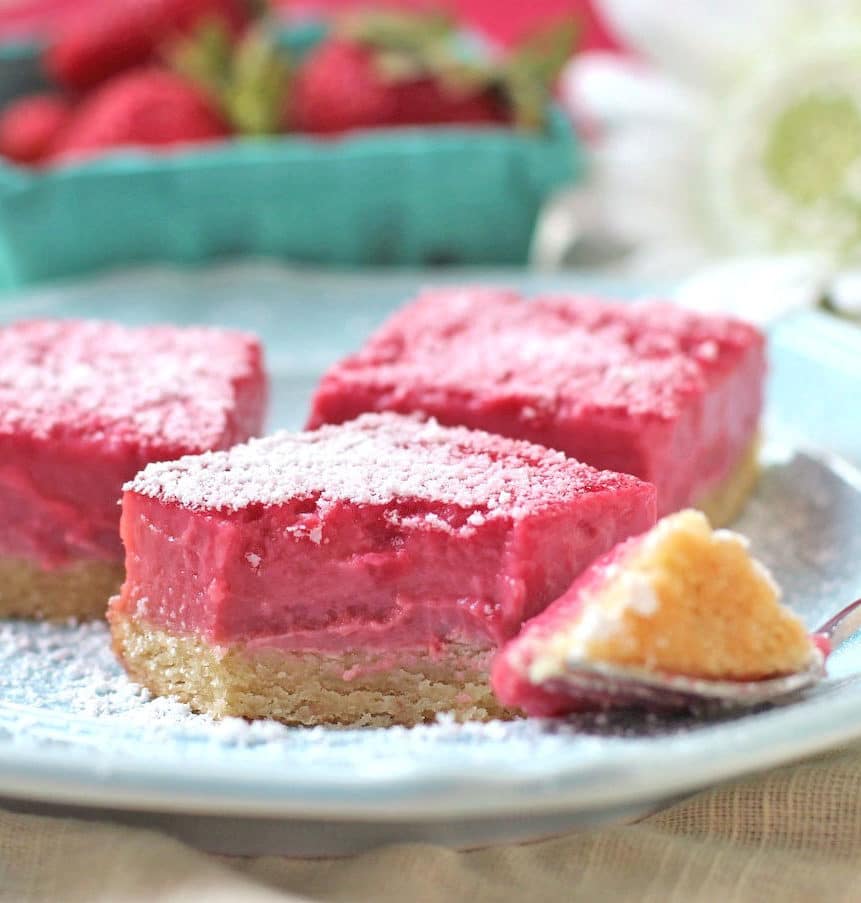 These Raspberry Lemon Bars are sweet, simple and satisfying. They taste like they're full of sugar and butter, but shhhh, they're healthy! You'd never guess these Pink Raspberry Lemonade Bars are sugar free, gluten free, dairy free, paleo, keto, and even high protein too!