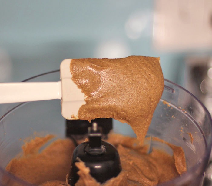 Healthy Homemade Peanut Butter being made in a food processor - Desserts With Benefits