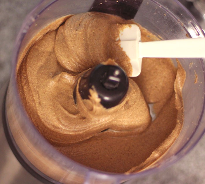 Healthy Homemade Peanut Butter being made in a food processor - Desserts With Benefits