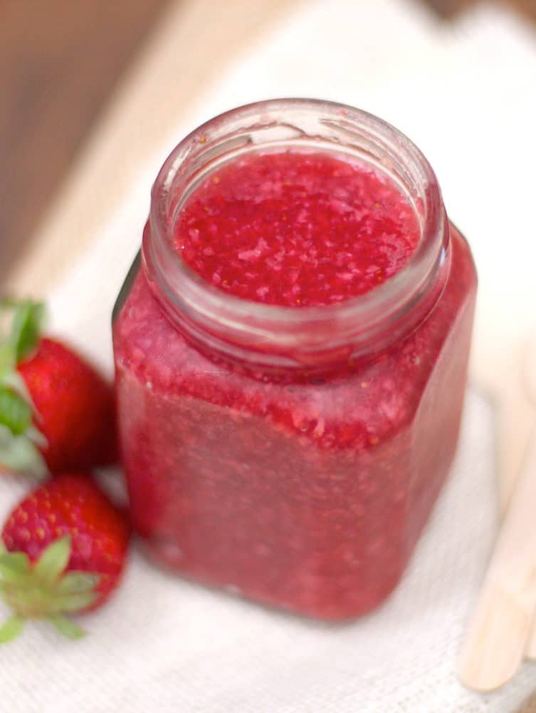 This Healthy Homemade No Cook Strawberry Jam is made with sweet, fresh strawberries, and none of the added sugar or corn syrup. It's perfect on toast!
