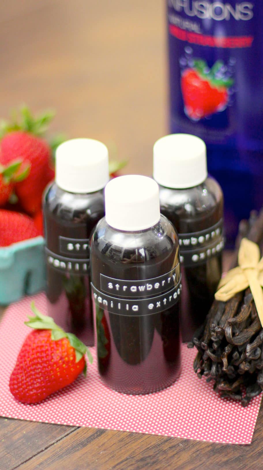 Do you ever wish Vanilla Extract had a little more oomph? Well, now it does! This super easy, 2-ingredient strawberry-infused homemade Vanilla Extract is perfect for cakes, frostings, ice creams and more!