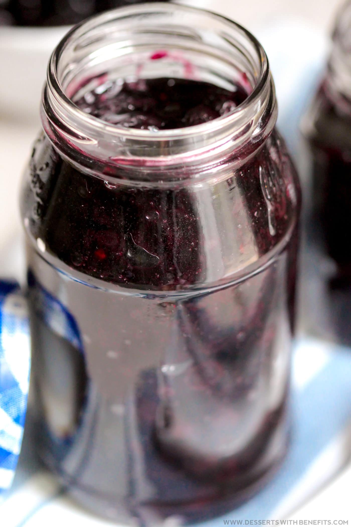 This Healthy Blueberry Compote Topping recipe is sweet and BURSTING with bright and fresh blueberry flavor, yet it's secretly all natural, refined sugar free, fat free, gluten free, dairy free, and vegan! Perfect for topping pancakes, waffles, oatmeal, yogurt, cheesecake, pound cake, and more!