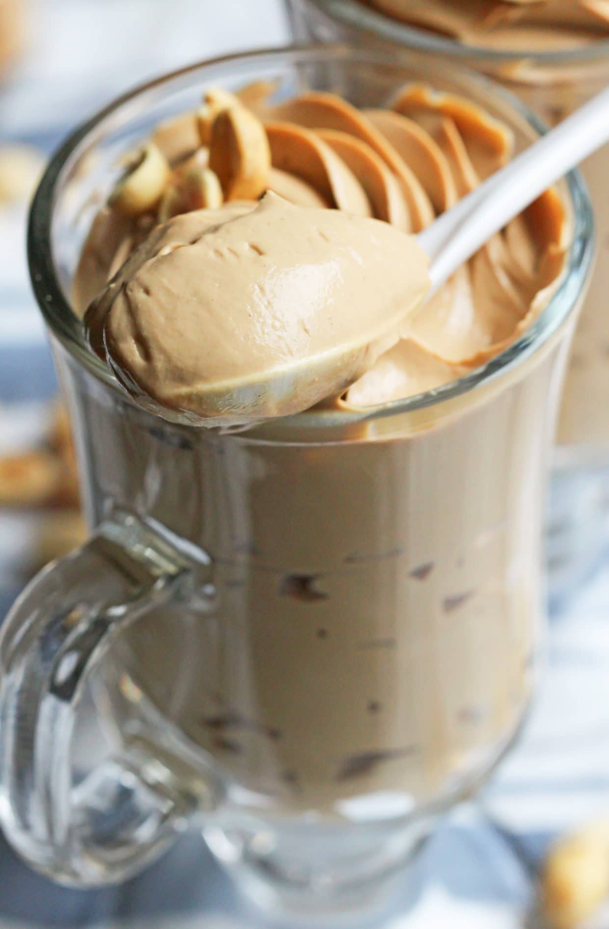 This rich and decadent Healthy Peanut Butter Mousse recipe is secretly guilt free, sugar free, low carb, high protein, gluten free, dairy free, AND vegan! -- Healthy Dessert Recipes at Desserts with Benefits