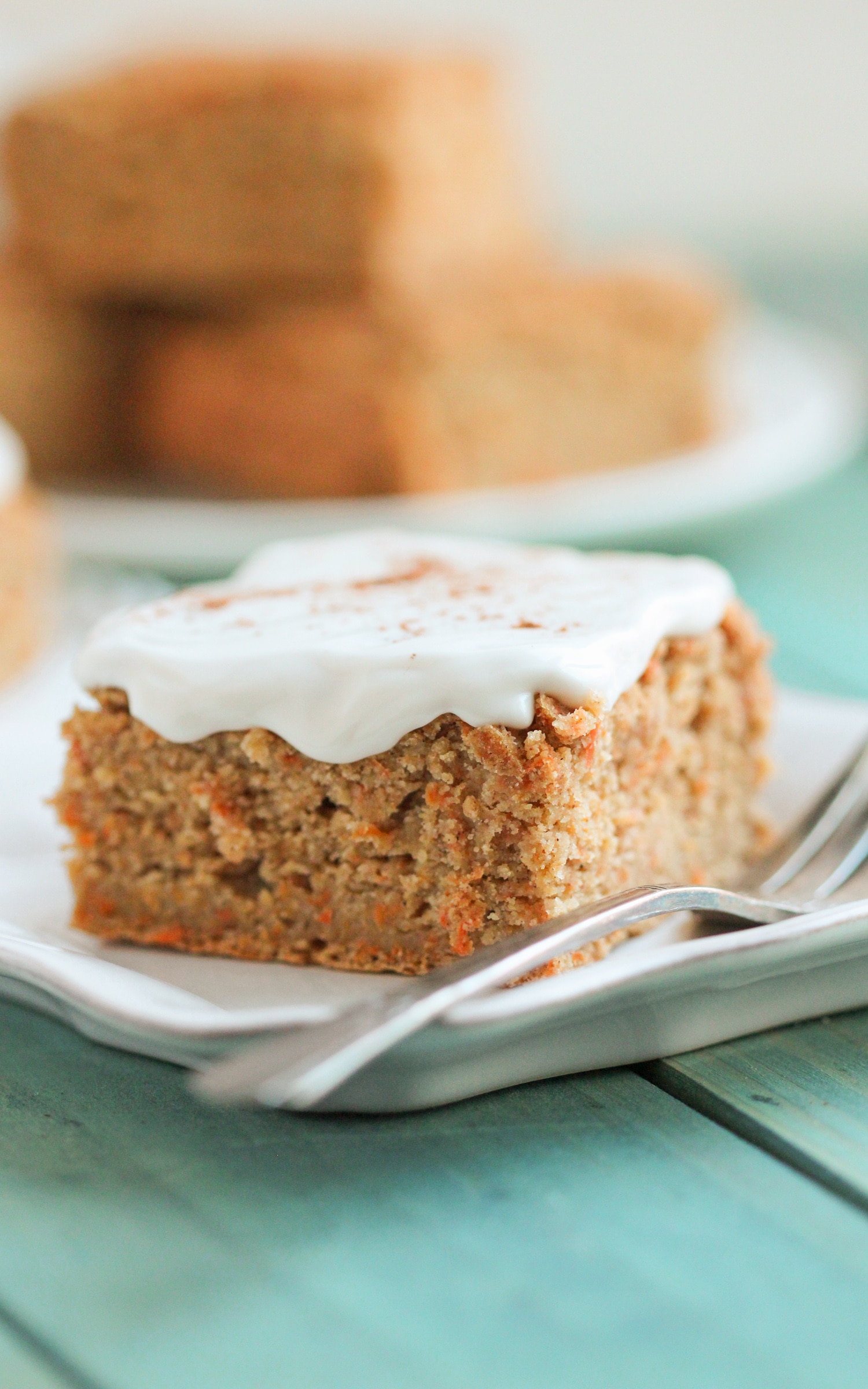 These Healthy Carrot Cake Blondies are sweet, dense, chewy, and PACKED with Carrot Cake flavor. Even with one cup of grated carrots, no one could detect any vegetables! And we definitely wouldn't have ever guessed it's sugar free, low fat, gluten free, and vegan. -- Healthy Dessert Recipes at the Desserts With Benefits Blog (www.DessertsWithBenefits.com)