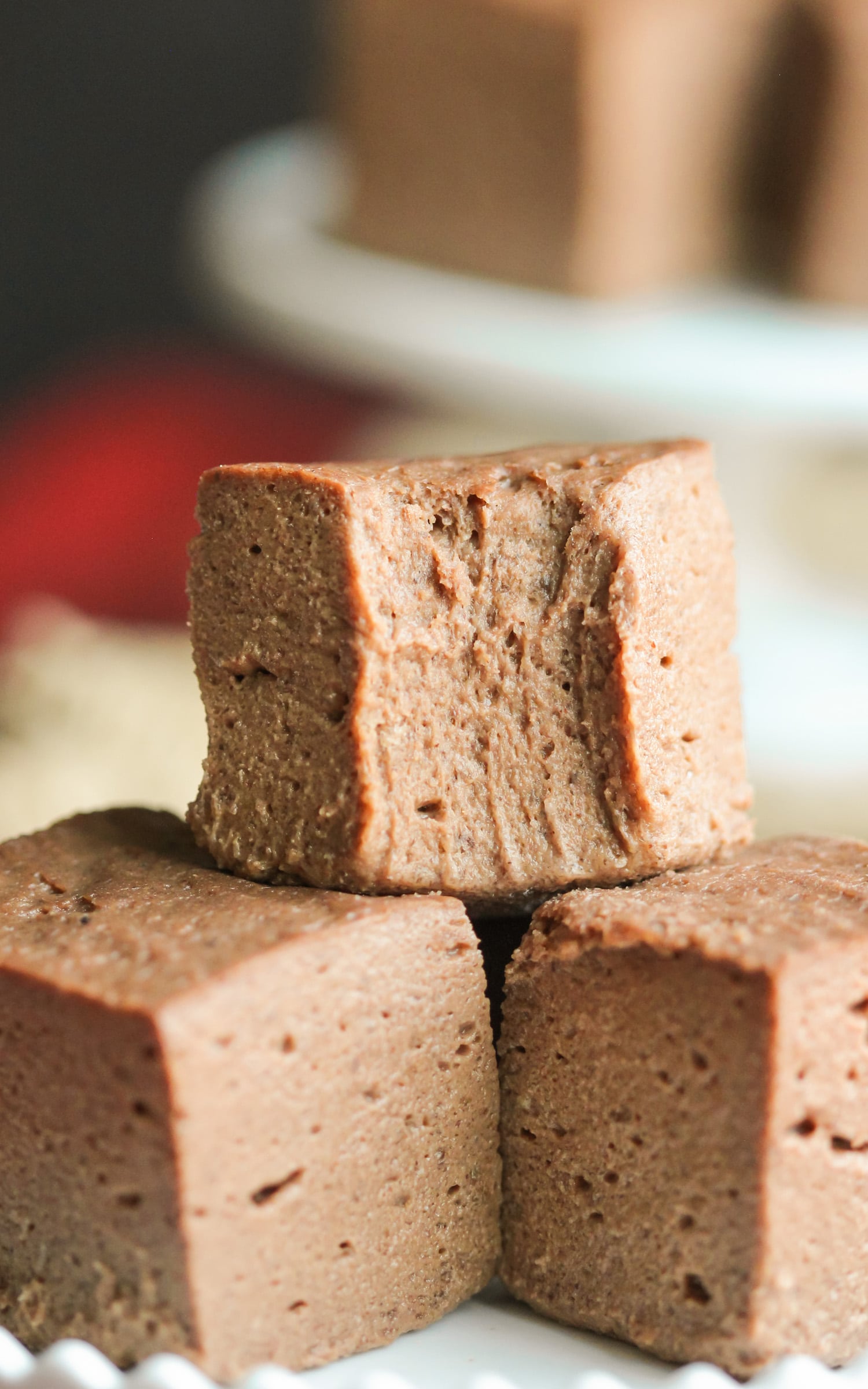 This Healthy Nutella Fudge is sweet, chocolatey, fluffy, and delicious. Oh, and it's made with two secret ingredients! Can you guess what they are? This addicting fudge is packed full of protein, fiber, and healthy fats, and none of the added sugar or artificial ingredients. It sure doesn’t taste low calorie, sugar free, low carb, high protein, high fiber, and gluten free! -- Healthy Dessert Recipes at the Desserts With Benefits Blog (www.DessertsWithBenefits.com)