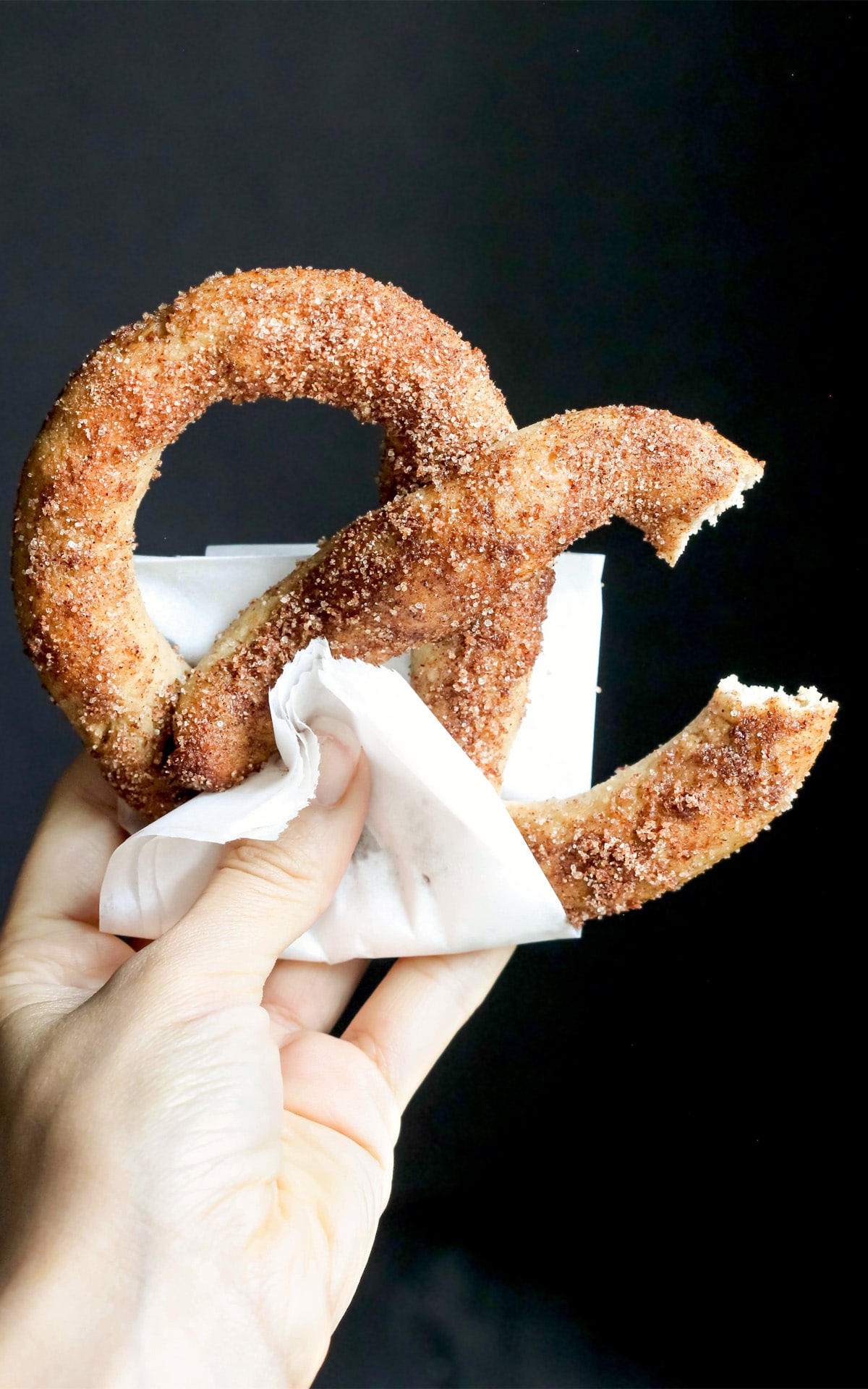 These Healthy Low Carb and Gluten Free Cinnamon Sugar Soft Pretzels are so fluffy and delicious, you'll never believe they're sugar free, low carb, high protein, and high fiber! -- Healthy Dessert Recipes with sugar free, low calorie, low fat, high protein, gluten free, dairy free, vegan, and raw options at the Desserts With Benefits Blog (www.DessertsWithBenefits.com)