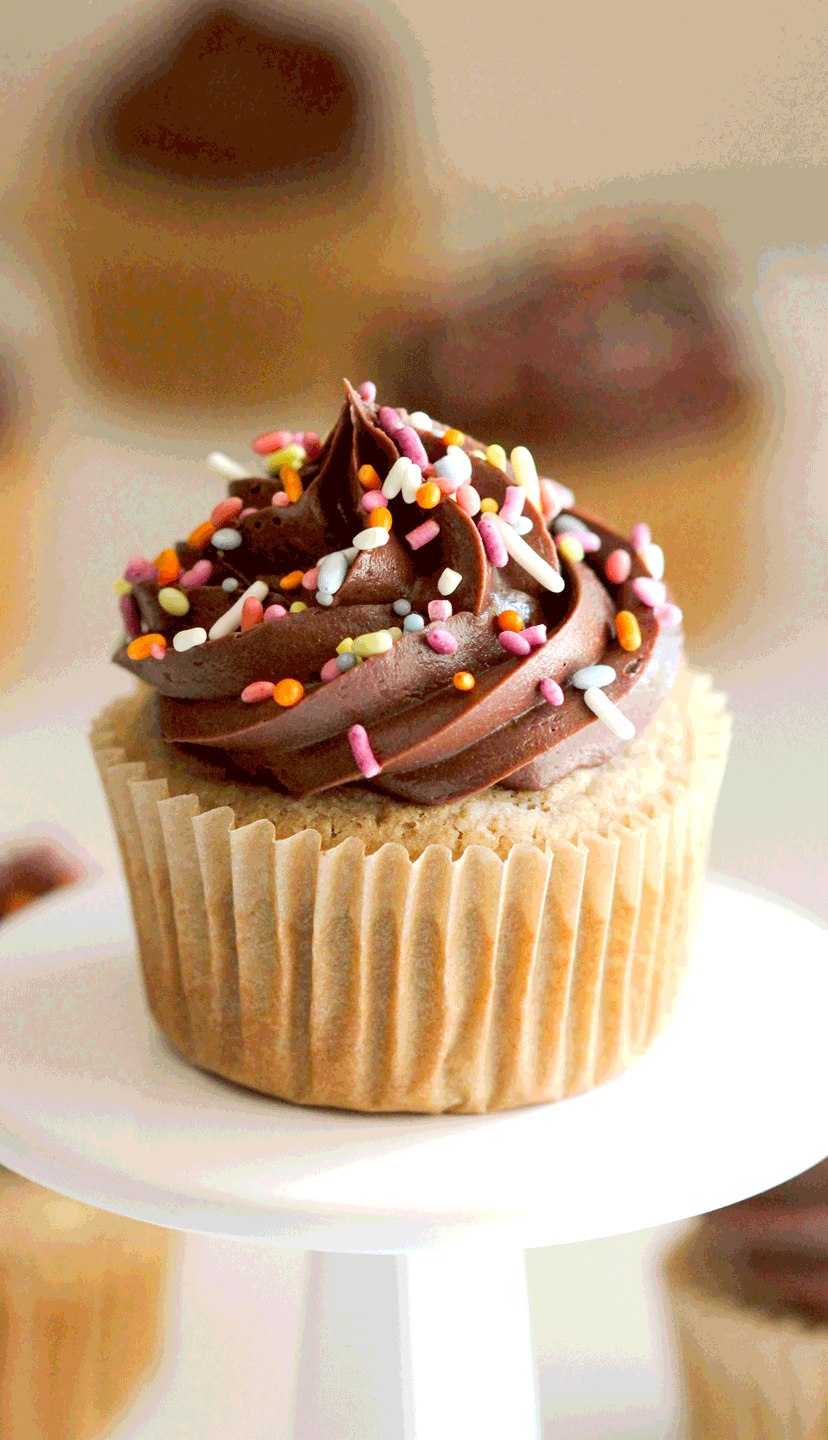 These Healthy Gluten-Free Vanilla Cupcakes will restore your faith in gluten-free baked goods! They're soft, fluffy, moist, and sweet with comforting tones of vanilla bean in every bite. You’d never know these are sugar free, low fat, gluten free, and just 90 calories per cupcake! Healthy Dessert Recipes with sugar free, low calorie, low fat, low carb, high protein, gluten free, dairy free, vegan, and raw options at the Desserts With Benefits Blog (www.DessertsWithBenefits.com)