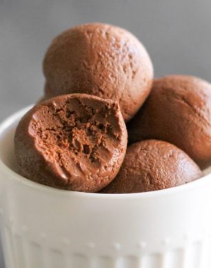 These 50-calorie Healthy Chocolate Fudge Truffles taste like heaven in a bite-sized package! They’re so sweet, chocolatey, and fudgy, you'd never be able to tell they’re low calorie, low carb, sugar free, high protein, dairy free, AND vegan! Healthy Dessert Recipes at the Desserts With Benefits Blog