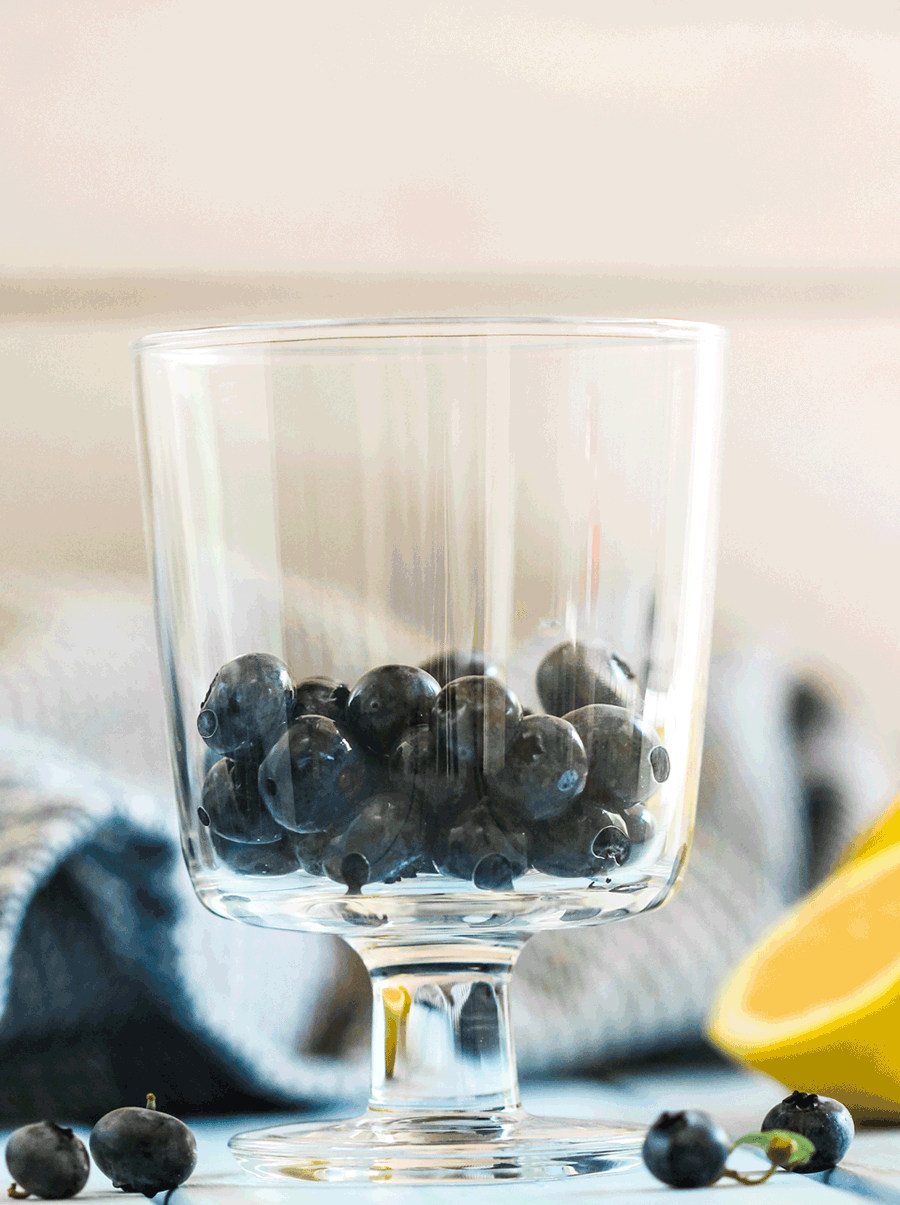 4-ingredient Blueberry Lemon Ricotta Parfaits! Beautiful, sophisticated, SO easy to make. The tart lemon balances the rich and creamy ricotta layers, and the blueberries complement both perfectly. Sugar free, low carb, high protein, and gluten free too! Healthy Dessert Recipes at the Desserts With Benefits Blog