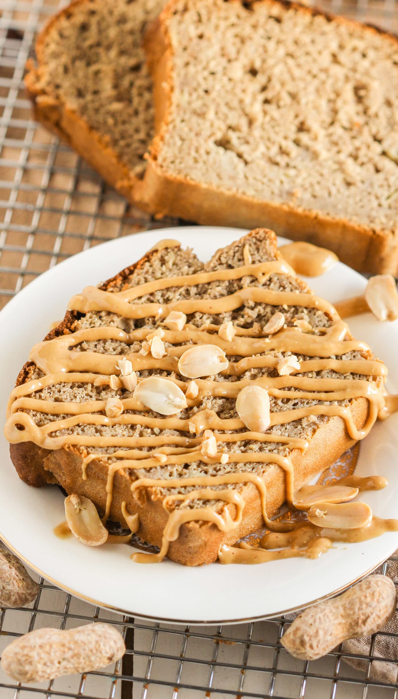 This is the BEST Healthy Peanut Butter Banana Bread EVER! It’s so rich, moist, and flavorful, one bite and you'll wonder how there’s no butter and no sugar added. Yes, this bread is refined sugar free, gluten free, AND high protein! Healthy Dessert Recipes with low calorie, low fat, low carb, gluten free, dairy free, vegan, and raw options at the Desserts With Benefits Blog (www.DessertsWithBenefits.com)