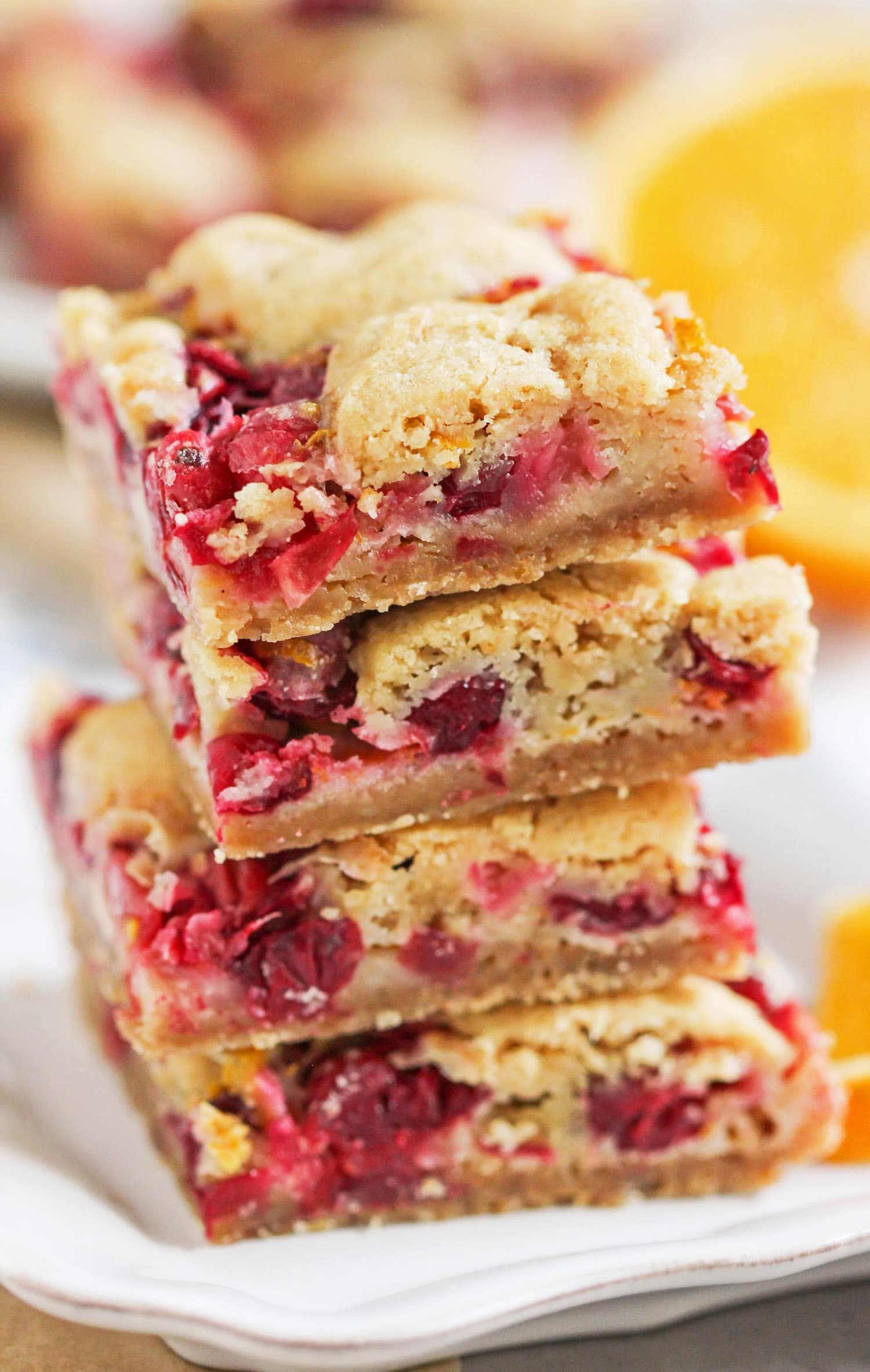 Guilt Free Cranberry Orange Bars – where blondies meet pie. These are seriously like a mix between sugar cookie blondies, a slice of cranberry pie, and the cranberry bliss bars at Starbucks. The perfect treat for the holidays. The kicker? They're low calorie, reduced fat, and lower sugar than your typical holiday desserts. Healthy Dessert Recipes at the Desserts With Benefits Blog (www.DessertsWithBenefits.com)