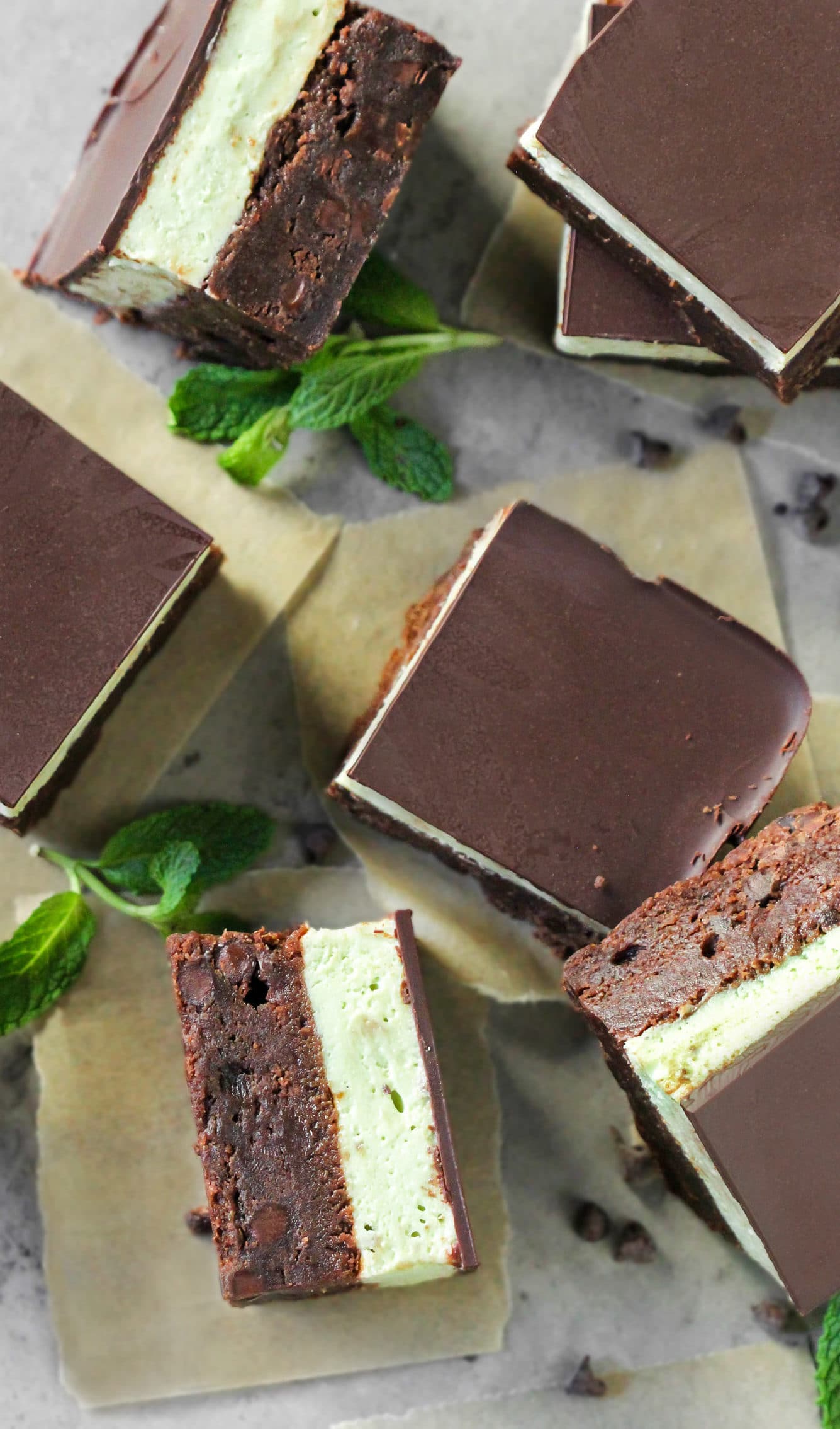 These Grasshopper Brownies are chocolatey, minty, sweet, and SUPREMELY delicious! Made with the fudgiest of the fudgy brownie base, a thick layer of mint frosting, and the perfect amount of dark chocolate to top everything off. This is one incredible, if not mind-blowing, dessert! Healthy Dessert Recipes at the Desserts With Benefits Blog (www.DessertsWithBenefits.com)