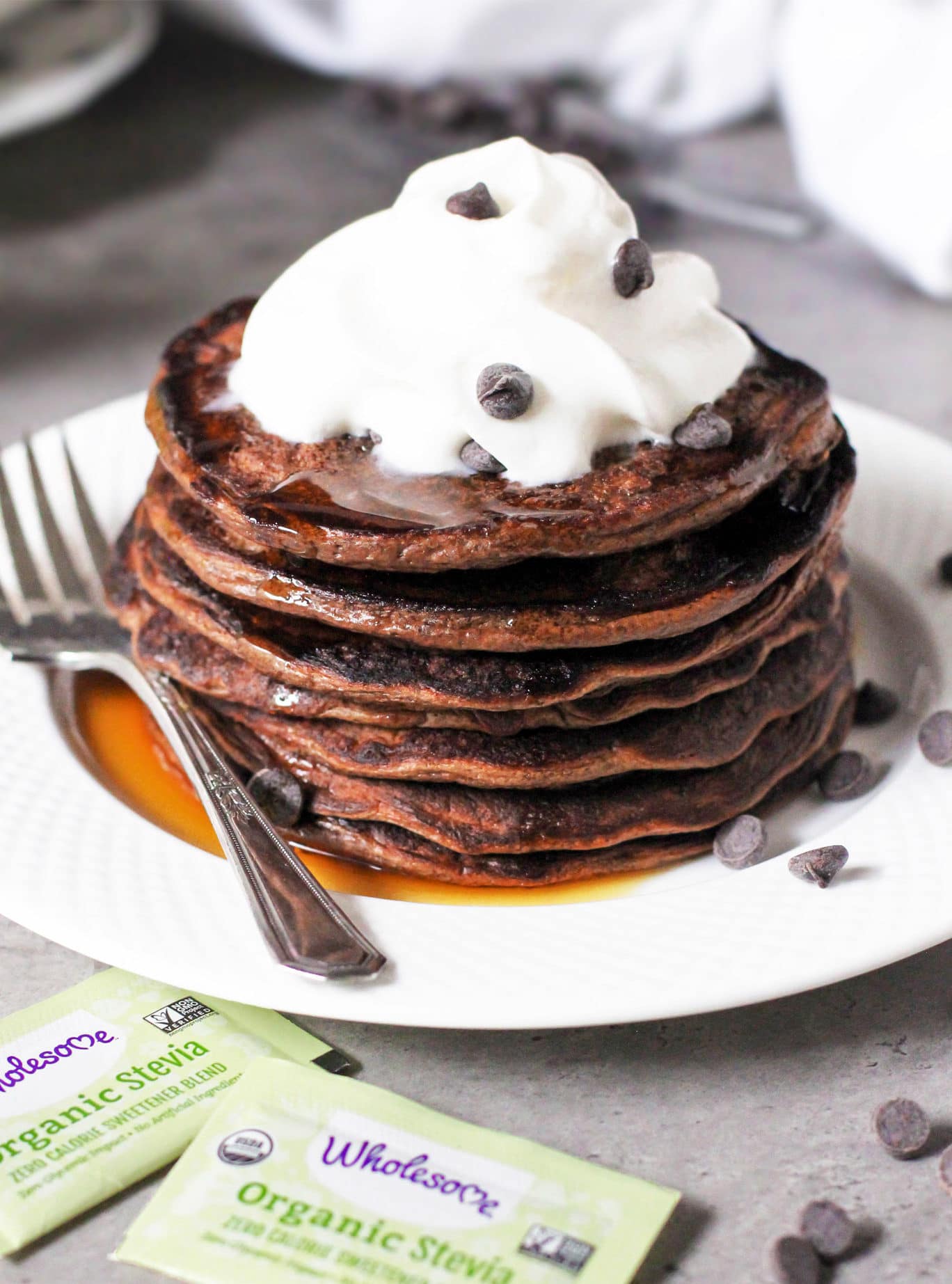 These Healthy Chocolate Protein Pancakes are uber light and fluffy, and they're perfectly sweet and chocolatey too. One bite and you won't be able to tell they're gluten free, sugar free, low fat, and packed with a whopping 18g of protein per serving!