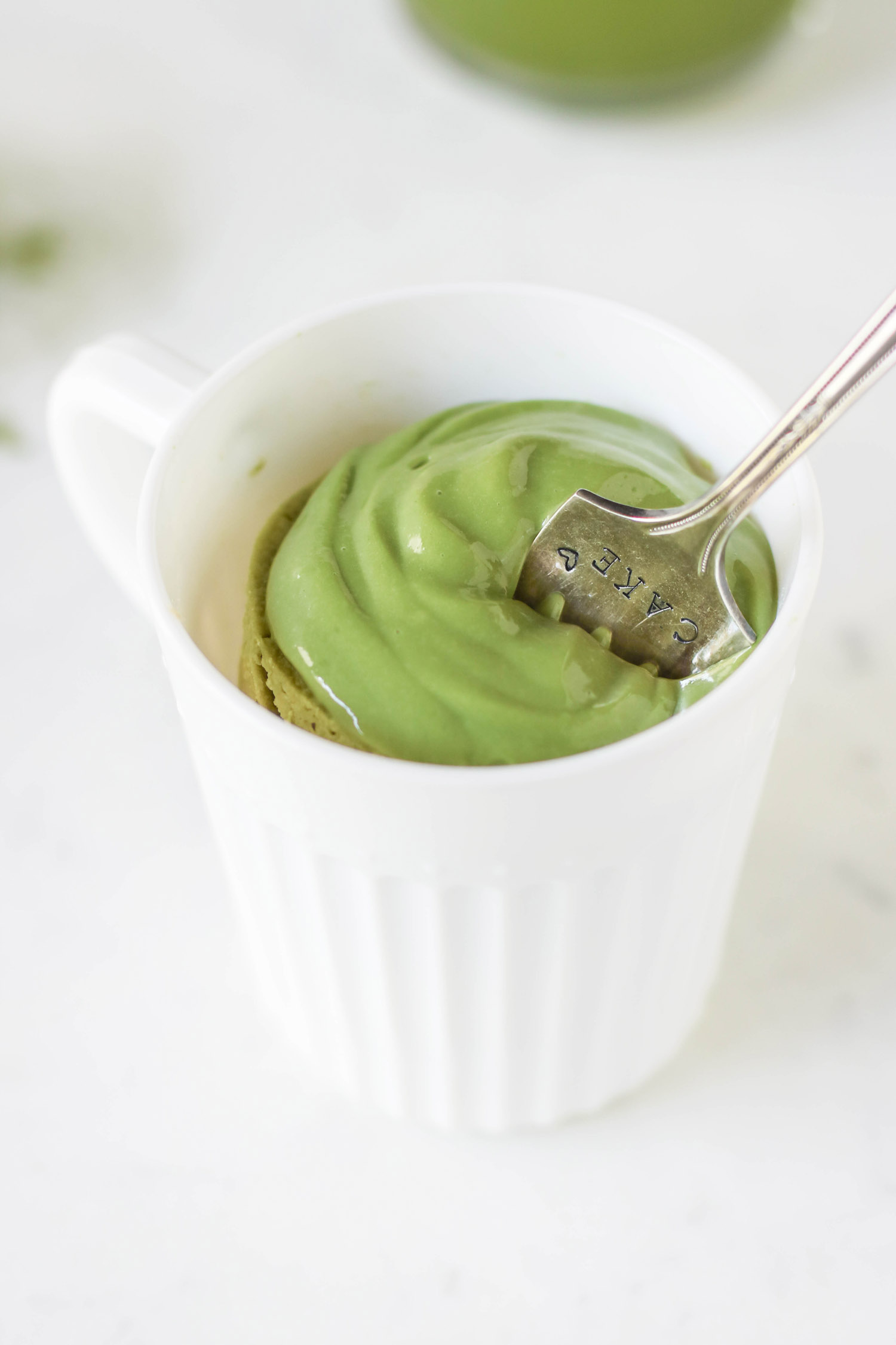 You can make this Healthy Single-Serving Matcha Microwave Cake in TWO minutes flat! This soft, springy, delicious cake makes the perfect balanced breakfast, snack, AND dessert. Plus, a Matcha Protein Frosting to top it off. This entire recipe has just 180 calories, and is sugar free, low carb, high protein, high fiber, and gluten free too! Healthy dessert recipes at the Desserts With Benefits Blog (www.DessertsWithBenefits.com)