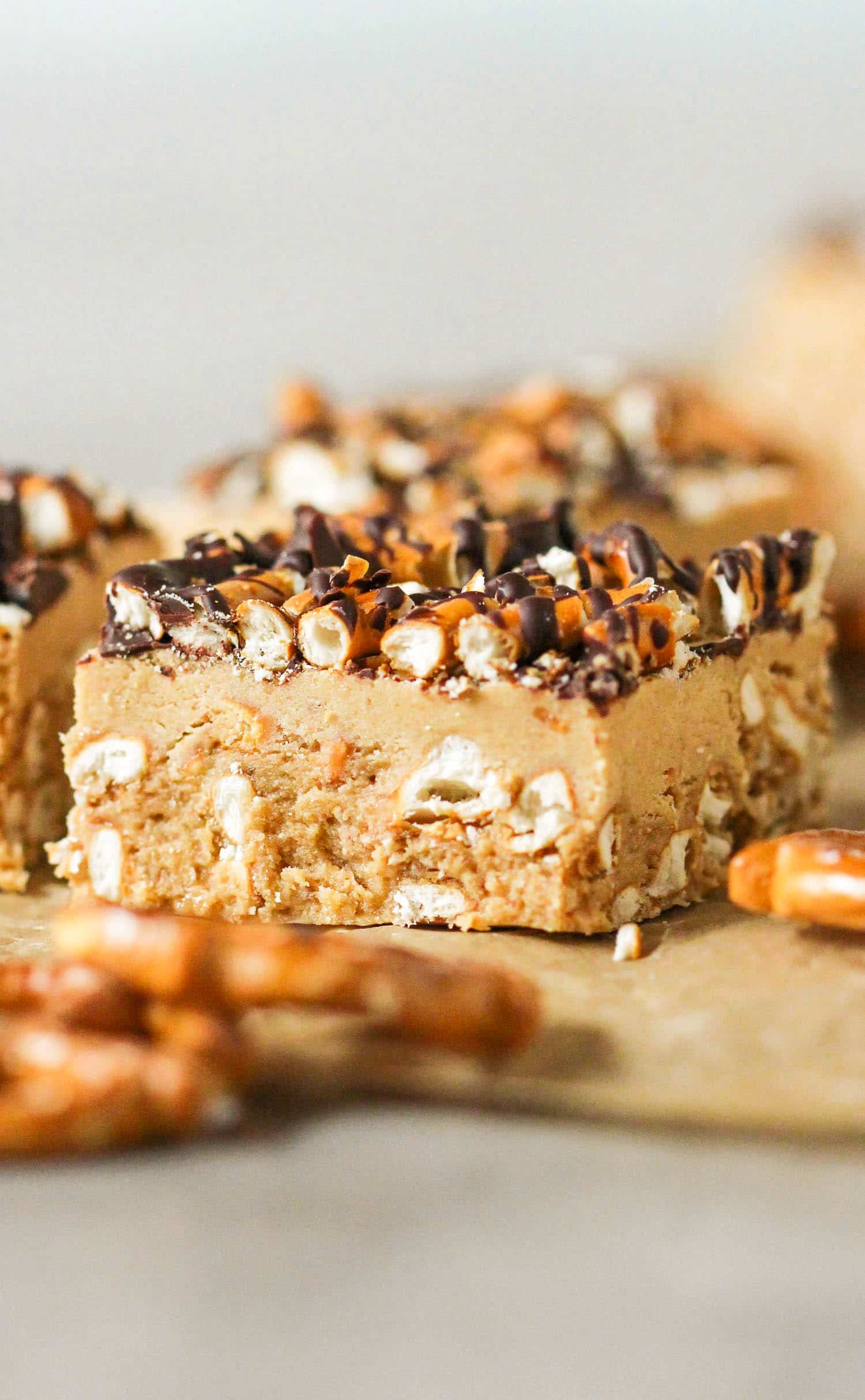 Healthy Chubby Hubby Fudge -- sweet, salty, chewy, and crunchy all at the same time, and packed with chocolate, peanut butter, and pretzels. It's definitely addicting, but don't worry, it's refined sugar free and high protein (with an option to be gluten free too)! Healthy dessert recipes at the Desserts With Benefits Blog (www.DessertsWithBenefits.com)