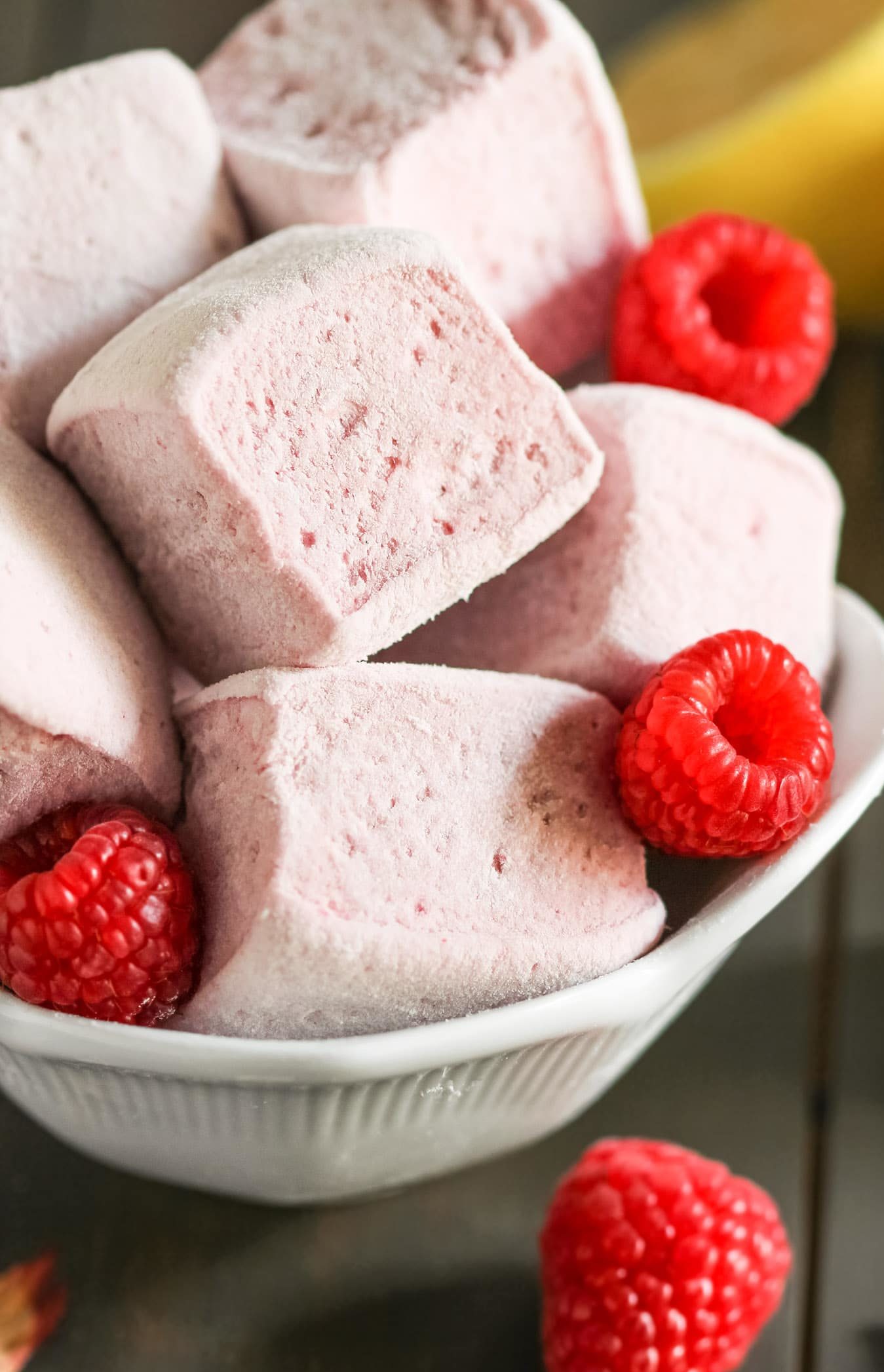 This recipe for Healthy Raspberry Lemon Hibiscus Marshmallows yields the lightest, fluffiest, and most flavorful mallows you could ever dream of! Sweet from the raspberries, tart from the lemon, unique from the hibiscus. Naturally sweetened (no corn syrup here!) and naturally pink from the hibiscus (no artificial food dyes whatsoever!) -- Healthy Dessert Recipes at the Desserts With Benefits Blog (www.DessertsWithBenefits.com)