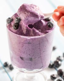 This Healthy Blueberry Protein Fluff is like a mixture between ice cream, whipped cream, and a cloud. So fluffy and voluminous with only 80 calories per serving. Plus, it's refined sugar free, low fat, high protein, and eggless! Healthy Dessert Recipes with sugar free, low calorie, low fat, low carb, high protein, gluten free, dairy free, vegan, and raw options at the Desserts With Benefits Blog (www.DessertsWithBenefits.com)