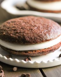 These Healthy Chocolate Whoopie Pies are so soft, light, and fluffy (like a hybrid between a cake and cookie), that you'd never ever know they're sugar free, high protein, gluten free, and dairy free too! Healthy Dessert Recipes with sugar free, low fat, gluten free, and vegan options at the Desserts With Benefits Blog (www.DessertsWithBenefits.com)