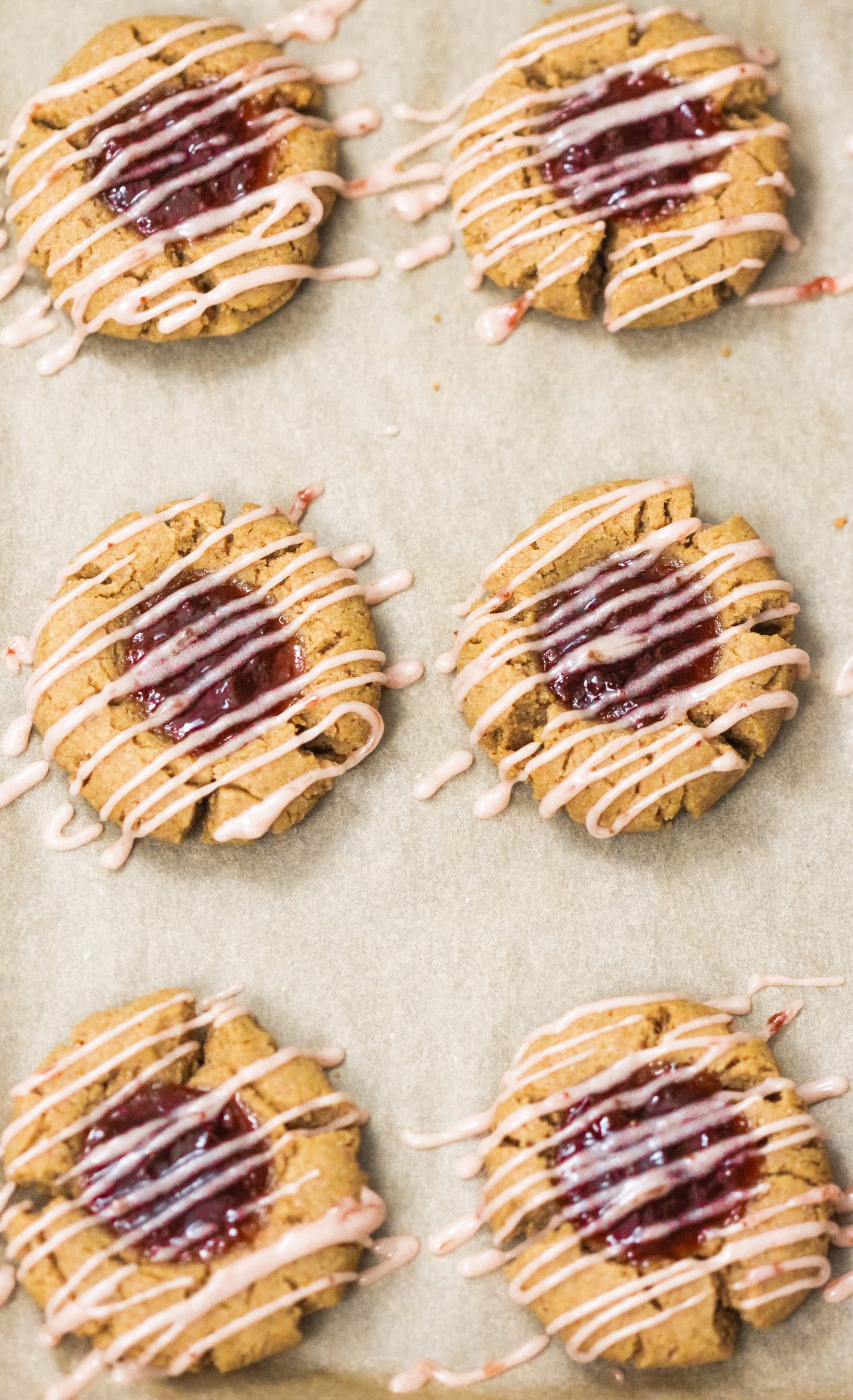 These Healthy Raspberry Thumbprint Cookies are so soft, chewy, and delicious (not to mention, easy to make!), you'd never know they're refined sugar free, gluten free, dairy free, and vegan too! Healthy Dessert Recipes with sugar free, low fat, gluten free, and vegan options at the Desserts With Benefits Blog (www.DessertsWithBenefits.com)