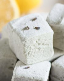 These Healthy Lemon Lavender Marshmallows are sweet, bright, refreshing, and delicious. They're like light and fluffy clouds of lemon-lavender goodness! Unlike storebought mallows, these are naturally flavored and naturally sweetened (no corn syrup or artificial ingredients here!). Healthy Dessert Recipes at the Desserts With Benefits Blog (www.DessertsWithBenefits.com)