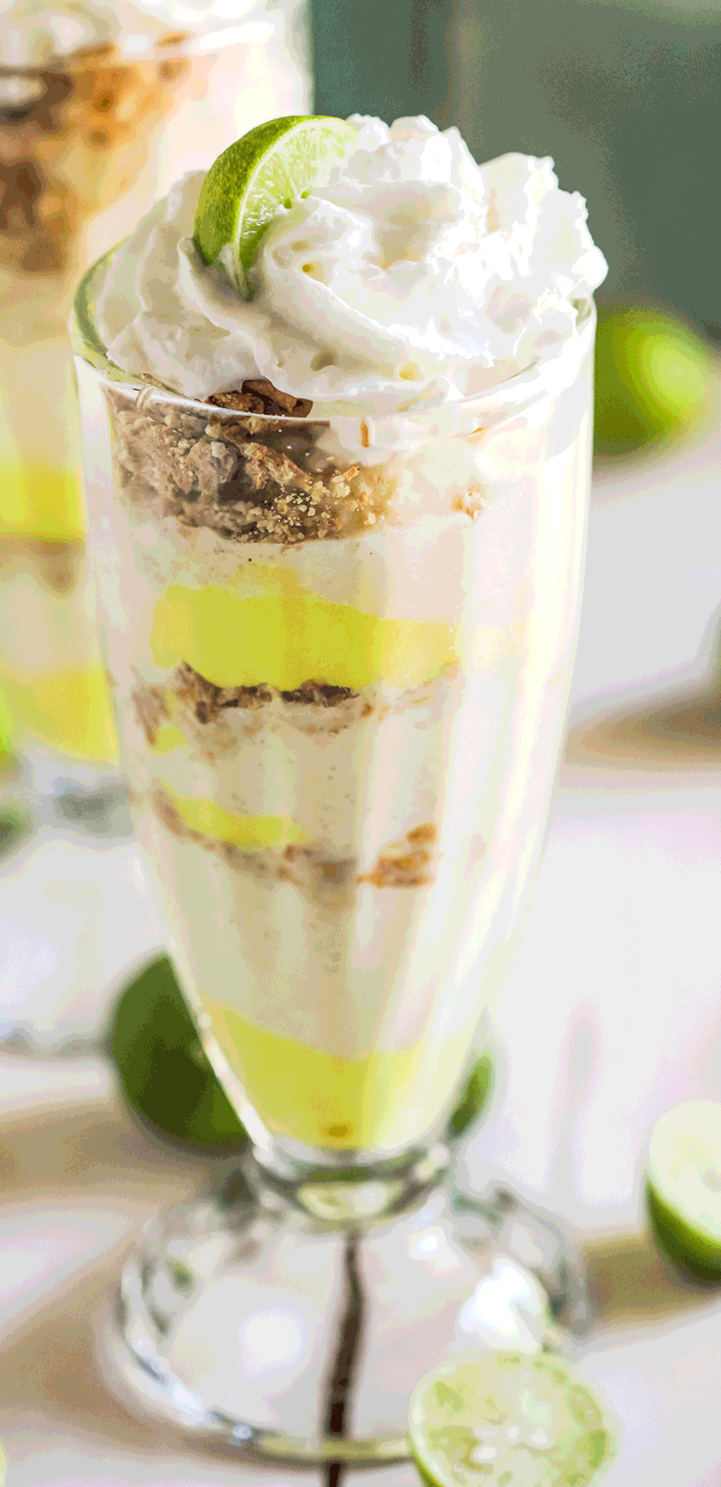 Can you believe these Healthy Key Lime Pie Sundaes are made completely from scratch? Oh yes. From the Vanilla Bean Frozen Yogurt to the Key Lime Curd to the Graham Crackers, it's all homemade! Low sugar, high protein, and gluten free too! Healthy Dessert Recipes with sugar free, low calorie, low fat, low carb, dairy free, vegan, and raw options at the Desserts With Benefits Blog