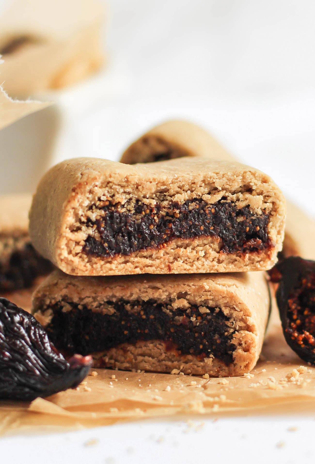 This easy Fig Newton recipe is 100% whole grain, gluten free, and vegan, with zero added sugar. Made with oat flour, dried figs, unsweetened applesauce, and a tad bit of coconut oil, these are chewy and perfectly sweet!