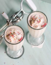 When you're craving cake but don't want to go through the hassle of baking, make this Cake Batter Milkshake! It's secretly sugar free, low fat, high protein, and gluten free too, made with kefir (or yogurt), oats, vanilla, and a couple secret ingredients that make it taste just like vanilla cake in drinkable form.