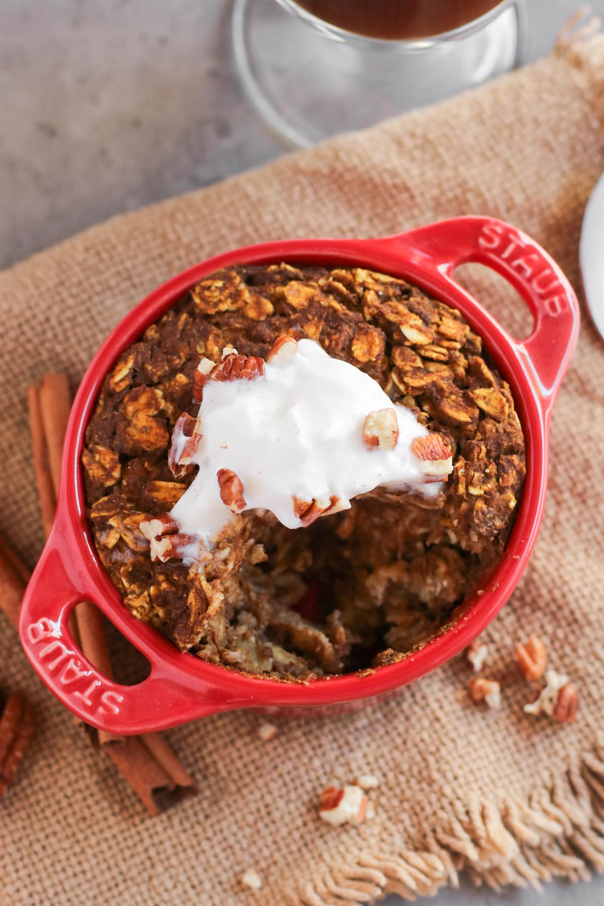 This super easy Healthy Single-Serving Pumpkin Pie Baked Oatmeal recipe is 100% whole grain, gluten free, and vegan, with no added sugar. It's dense, hearty, and filling, just like all baked oatmeal should be, and it's also packed full of pumpkin pie flavor, thanks to the canned pumpkin puree and pumpkin pie spice! #glutenfree #vegan #glutenfreevegan #pumpkinpie #bakedoatmeal #sugarfree #healthybreakfast #pumpkinpuree #pumpkinspice