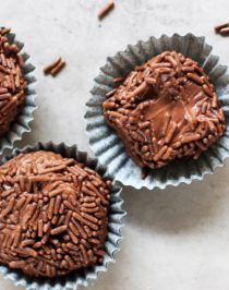 These Healthy Brigadeiros are ULTRA fudgy, smooth, and creamy, with a slight crunch from the chocolate sprinkles. The taste is SPOT ON! You'd never guess that these Brazilian chocolate truffles are made with healthier ingredient swaps to make them lower in calories, fat, and sugar compared to the original.