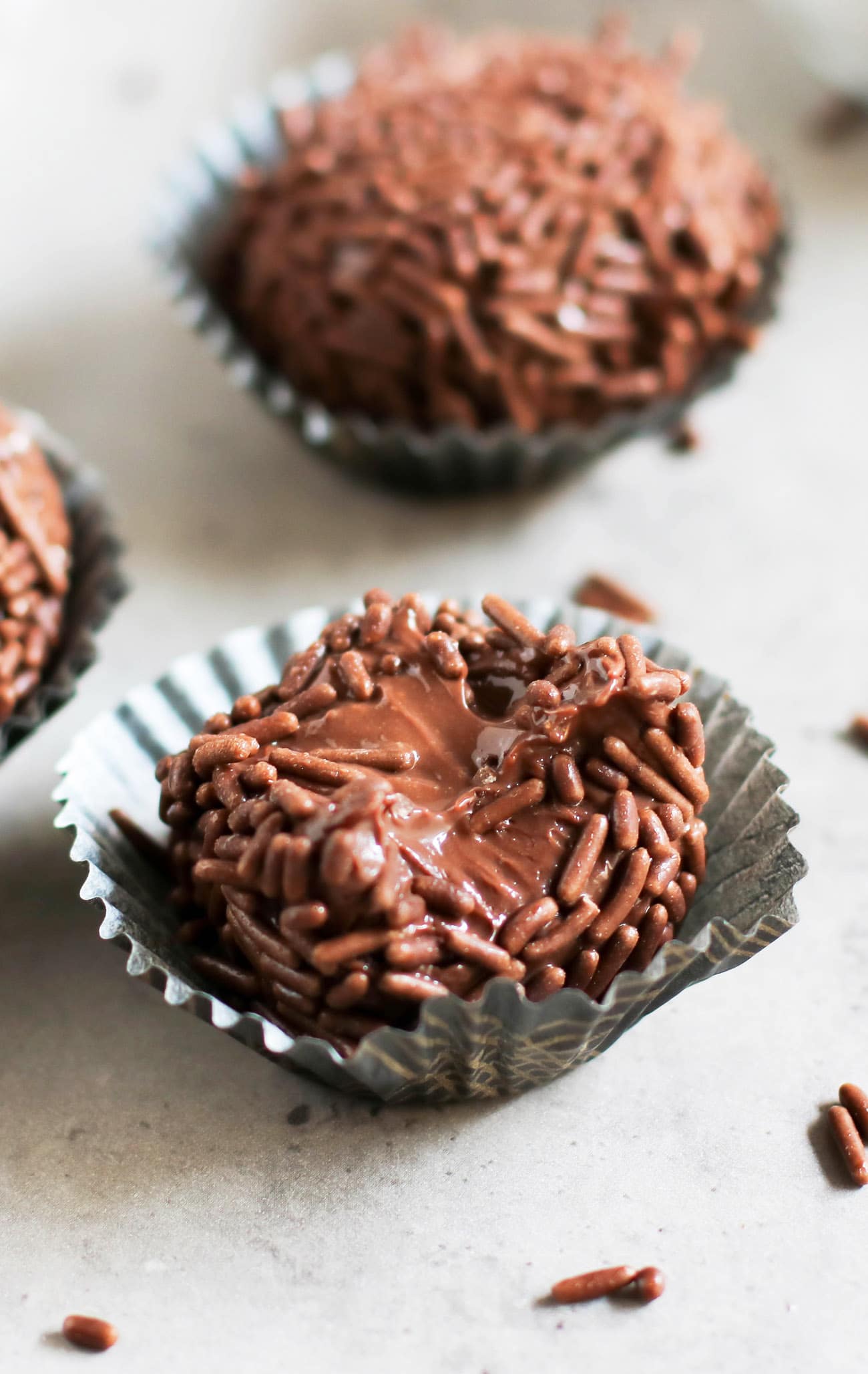 These Healthy Brigadeiros are ULTRA fudgy, smooth, and creamy, with a slight crunch from the chocolate sprinkles. The taste is SPOT ON! You'd never guess that these Brazilian chocolate truffles are made with healthier ingredient swaps to make them lower in calories, fat, and sugar compared to the original.