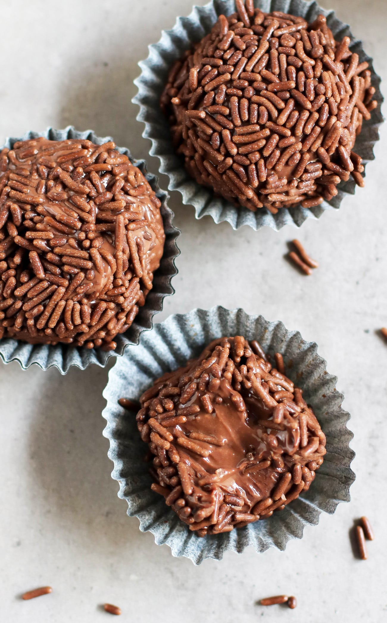 These Healthy Brigadeiros are ULTRA fudgy, smooth, and creamy, with a slight crunch from the chocolate sprinkles. The taste is SPOT ON! You'd never guess that these Brazilian chocolate truffles are made with healthier ingredient swaps to make them lower in calories, fat, and sugar compared to the original.