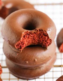 Red Velvet Cake + Donuts = Red Velvet Cake Donuts! They're sweet, moist, and ultra fluffy, they don't taste low calorie, low fat, sugar free, or gluten free at all, yet they are! They're ALL NATURAL and made without any artificial food coloring whatsoever! Can you guess the secret ingredient that makes these Red Velvet Donuts red? #glutenfreedonuts #glutenfreedessert #redvelvet #redvelvetcake #sugarfree #wholegrain #lowfat #lowcalorie #dairyfree