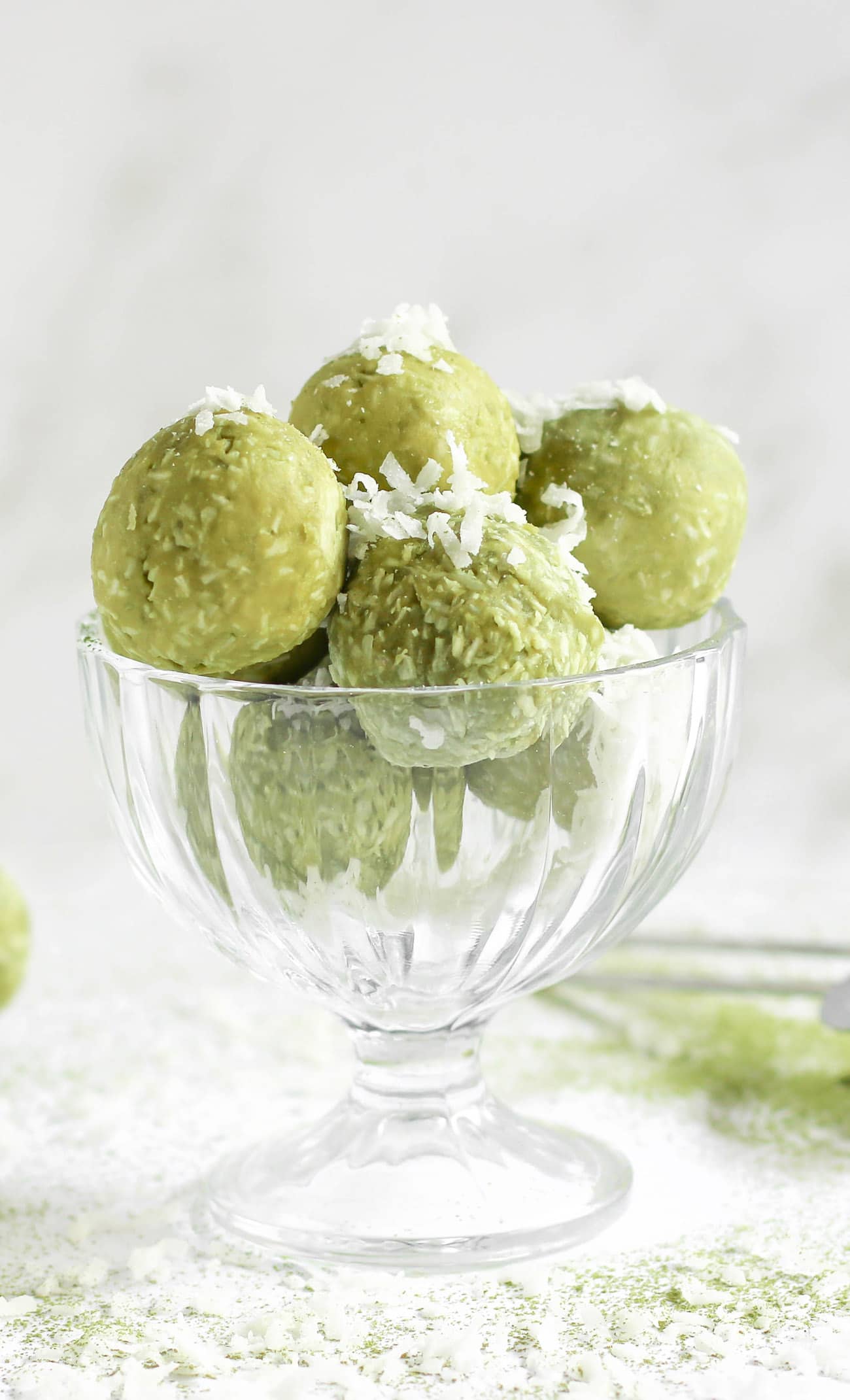 Easy, no-bake, 6-ingredient Matcha Coconut Truffles made healthy! They're rich and sweet yet made without butter, heavy cream, and sugar. They're keto-friendly, low carb, sugar free, and gluten free too!