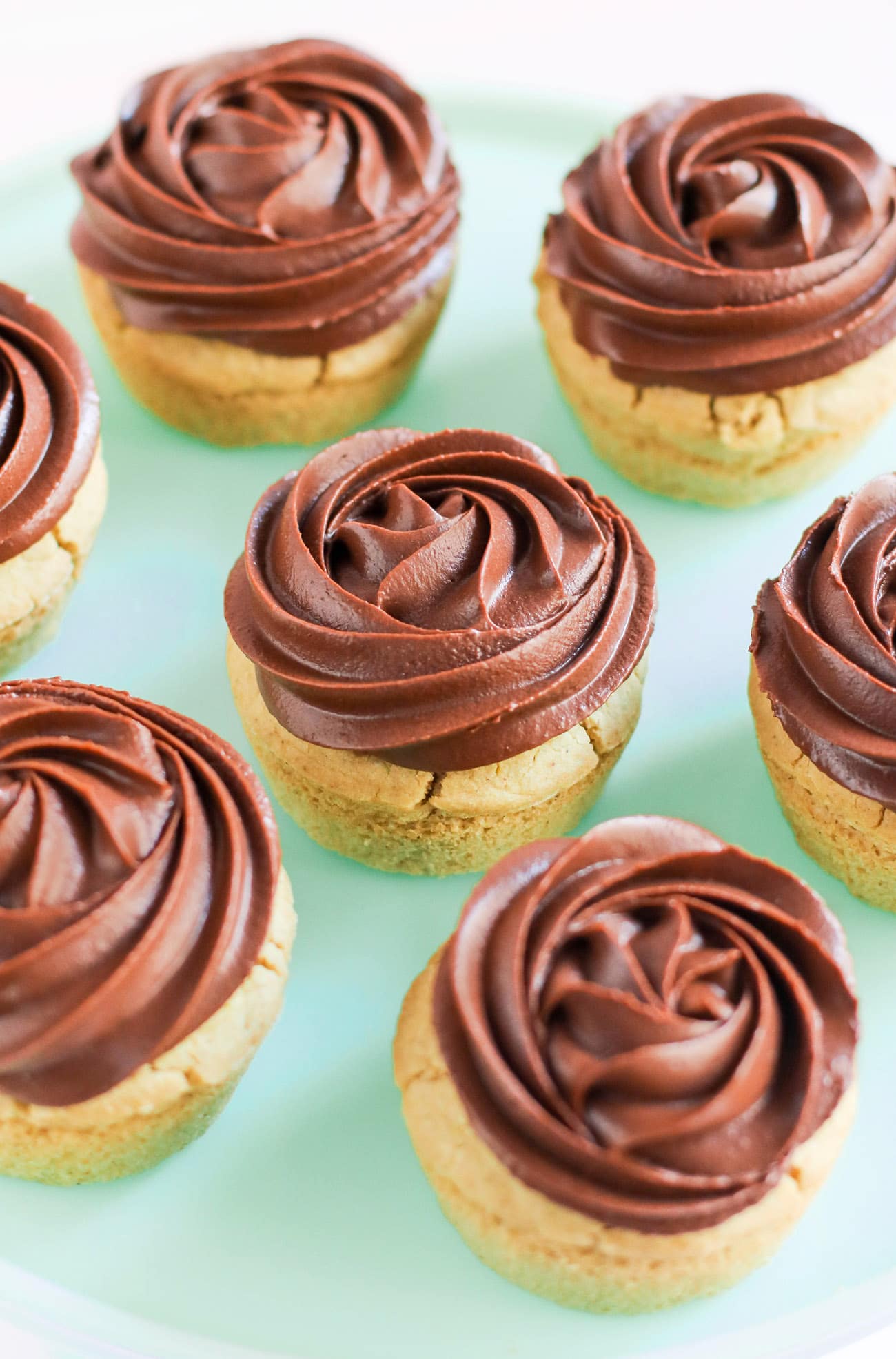 These Healthy Vanilla Quinoa Cupcakes are fluffy, springy, and moist! Top them with a healthy frosting and you've got the most nutritious, guilt-free treat! Made with quinoa flour, sorghum flour, coconut yogurt, and coconut milk, so they're gluten free, dairy free, vegan, and sugar free!