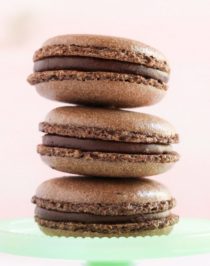 These Gluten Free Chocolate French Macarons are perfectly sweet and chewy, thanks to the almond meal and dark cocoa powder! Made without the bleached white sugar and artificial flavors, yet you'd never know! #chocolate #frenchmacarons #macarons #glutenfree #glutenfreemacarons #valentinesday