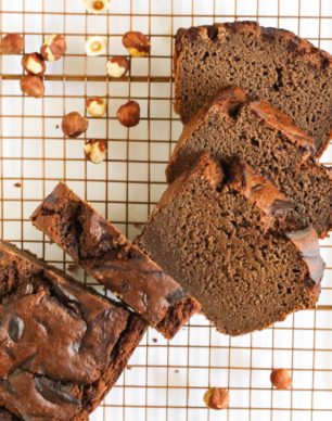 This Nutella Chocolate Banana Bread is so moist, fluffy, springy, and chocolatey! It doesn't taste healthy, sugar free, gluten free, dairy free, high protein, or whole grain ONE BIT. It tastes like it's from a bakery! Made with low carb, paleo, and keto-friendly homemade Nutella!