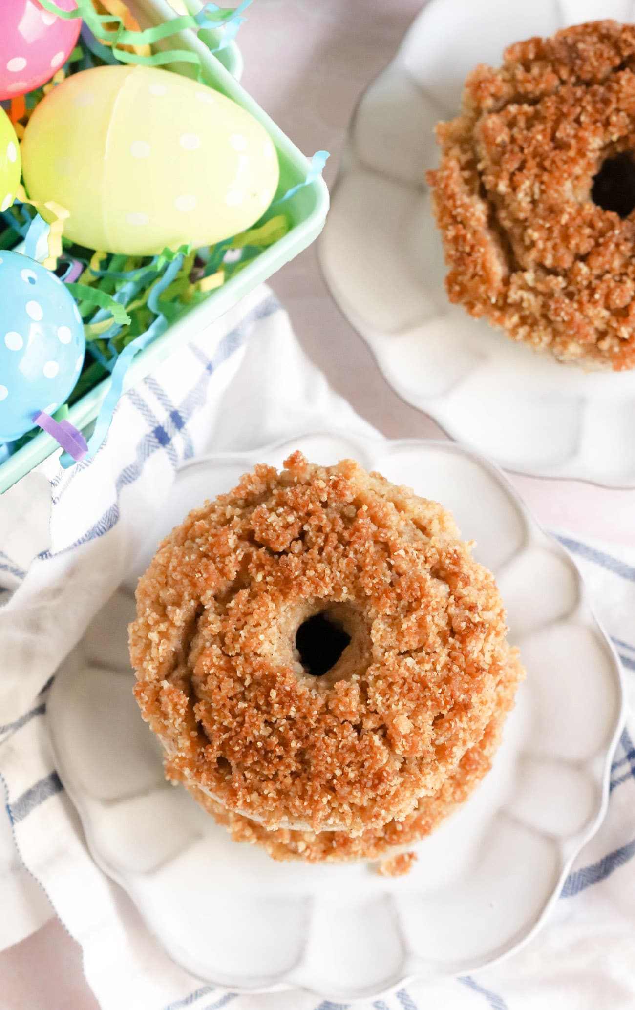 These easy Baked Crumb Donuts are rich, sweet, full of vanilla flavor, and a coffee cake-like crumb topping. Every bite is buttery and satisfying. You'd never know these donuts are gluten free, high protein, high fiber, and low sugar!